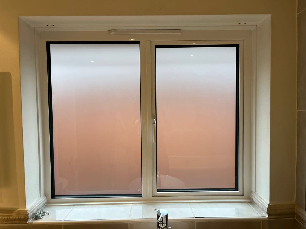 Window with privacy glazing
