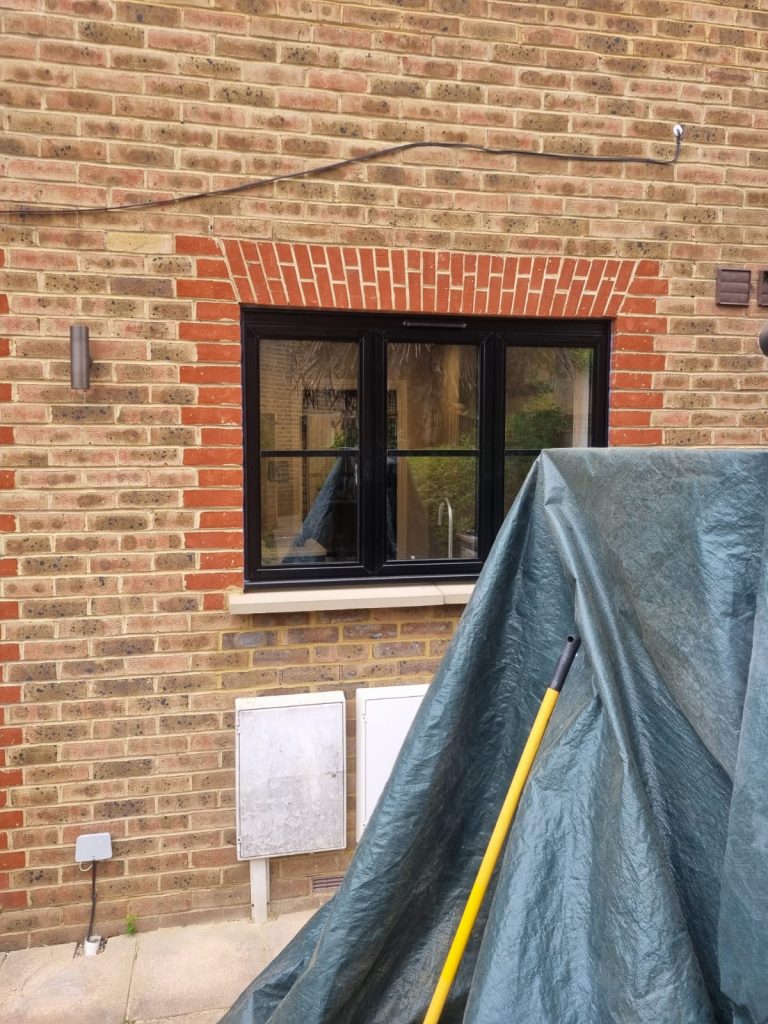 Smarts Heritage black window in brick house