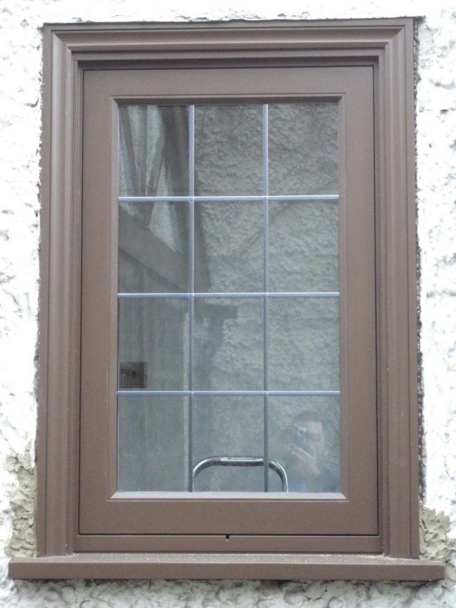 Beige single pane timber window Banstead