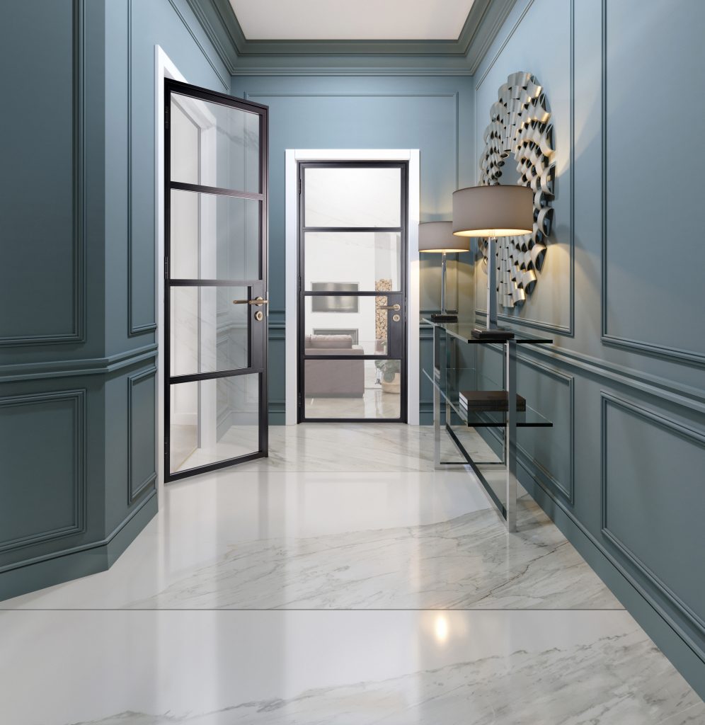 blue hallway with black steel look doors with glazing panels