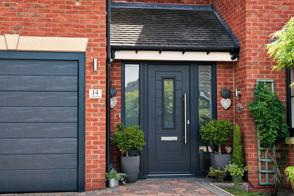A black Endurance door with window and letterbox.