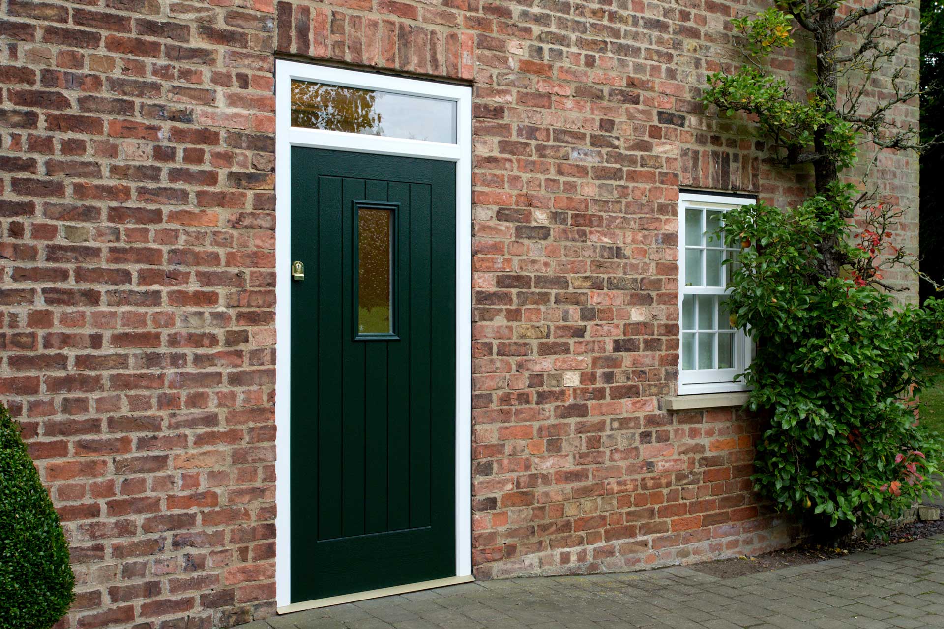 A racing green composite door.